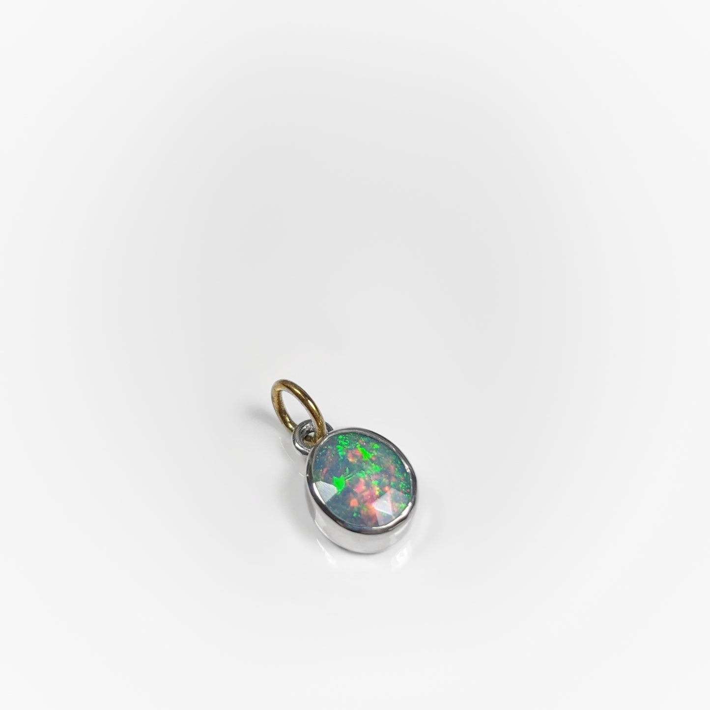 Storyteller Memorial Pendant | Welo Opal in Silver with Gold